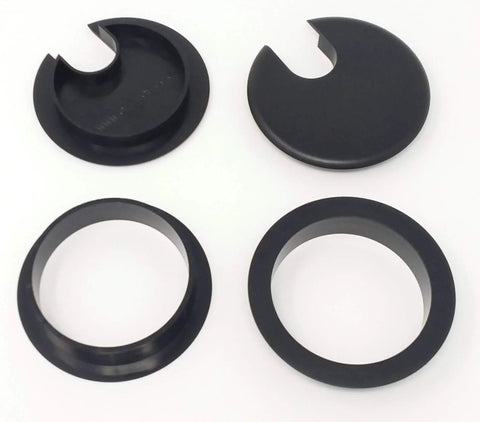 Heavy Duty Desk Grommet Covers For 2.5 Inch Cutouts Slick Black Plastic Cable Management Kit With Five Pieces showing four grommet designs.