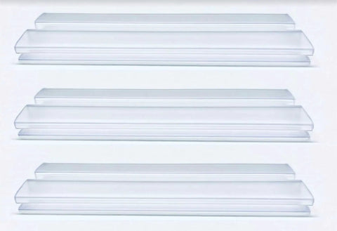 Skip The Drill These Clear PVC Piano Hinge Strips 18 Inches Long Grip 3 16 Inch Thick stacked for securing acrylic panels.