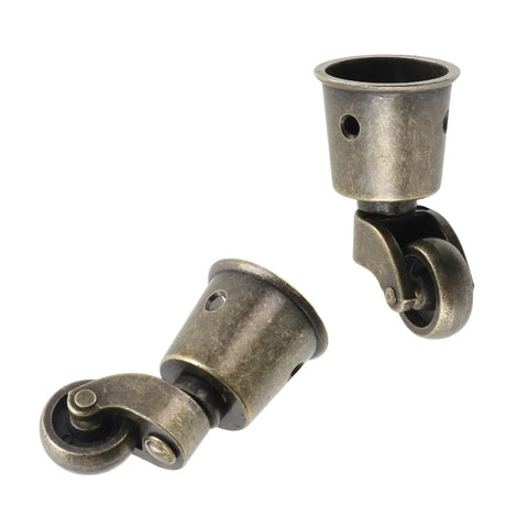Four Pack 360 Degree Swivel Cup Casters With Silent Rolling Precision Bearings Smooth Operator Antique Brass Furniture Wheels, close-up view.