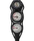 Black gauge with compass and pressure settings, used for measuring pressure in bar. Essential for diving equipment.