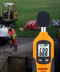 Digital Sound Level Meter With Backlight 30-130 dB Range Data Hold MAX/MIN Auto Power Off Dual Ranges HT-80A in use at construction site