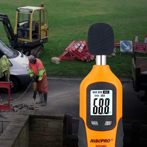 Digital Sound Level Meter With Backlight 30-130 dB Range Data Hold MAX/MIN Auto Power Off Dual Ranges HT-80A in use at construction site
