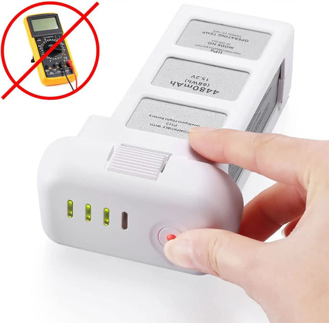 Phantom 3 Replacement Intelligent Flight Battery 4480mAh 15.2V 68Wh with LED indicators being pressed.