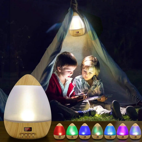 Children playing with tablets in a tent, illuminated by Star Projector Night Light With Timer For Kids 360 Degree Rotating Moon And Stars Sky Projector Lamp