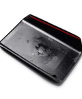 Sleek Carbon Fiber Center Console Cover Compatible With Tesla Model 3 And Model Y 2017 To 2023 showing the underside black finish.