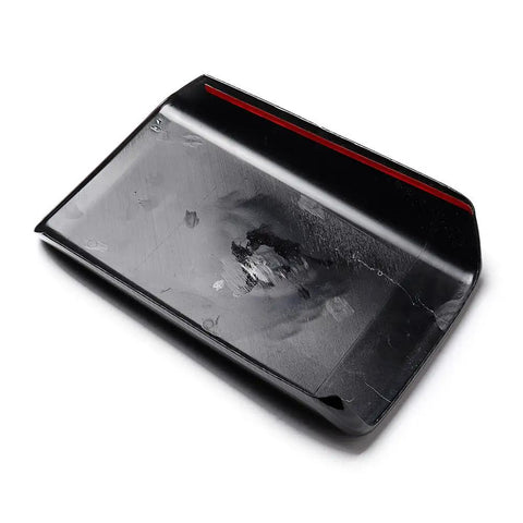 Sleek Carbon Fiber Center Console Cover Compatible With Tesla Model 3 And Model Y 2017 To 2023 showing the underside black finish.
