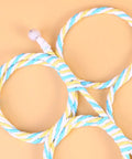 Close-up of colorful paper rattan rings for Paper Rattan Scarf Hanger With 12 Foldable Rings For Wardrobe And Closet Organization Keep Your Fits Tight With This Dope Hijab Holder And Tie Rack Zero Clutter Vibes Guaranteed.