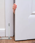 Tough As Nails Stainless Steel Fire Door Closer With Automatic Self Closing Hinge For Commercial Doorways and Cabinet Locks, with a hand gripping a door.