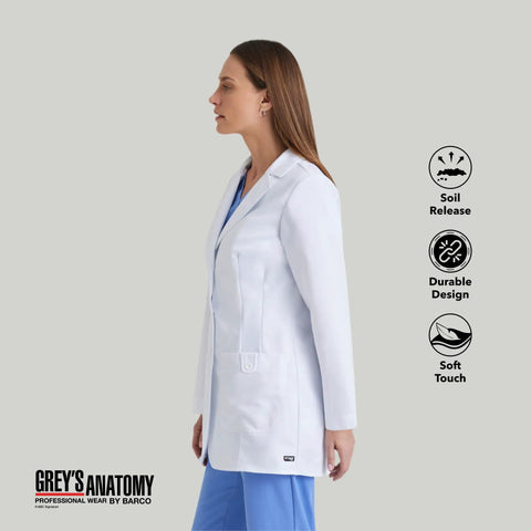 Side view of a woman wearing Missy White Lab Coat With Back Tab Two Pockets Button Closure Tagless Inside Label Small Size.