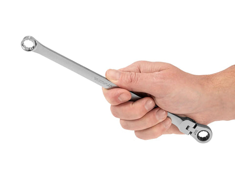 Hand holding Seven Sixteenth Inch Long Fixed And Ratcheting Box End Wrench With Dual Head 12 Point Flex Head And Fixed Head For Tight Spots