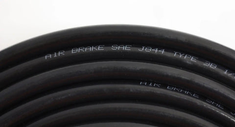 Close-up of coiled One Half Inch 500 Feet Black Nylon Air Brake Tubing SAE J844 DOT Approved, showing printed specifications.