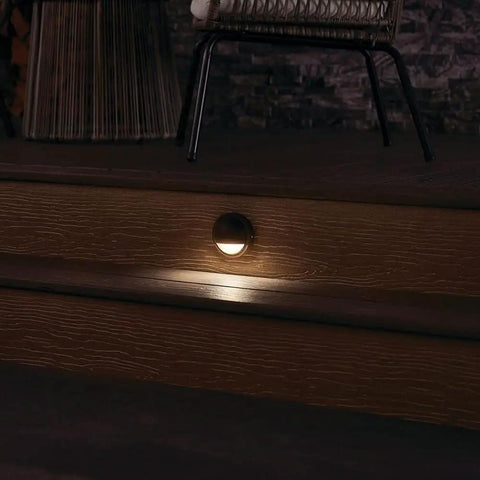 Half Moon LED Deck Light Low Voltage 12V Outdoor Weatherproof Fixture Sleek White Finish on wooden step at night