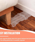 Two Pack Clear Acrylic Sofa Wall Spacers Keep Paint Fresh And Block Deep Scratches With Reusable Invisible Gap Push Backers under a couch leg.