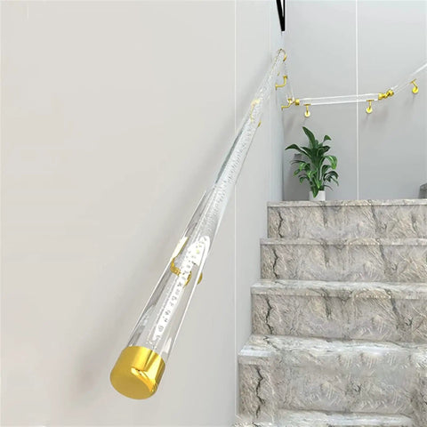 Hella Tough Clear Acrylic Railing One Point Six To Nineteen Point Seven Feet No Sweat Wall Mounted Non Slip Guard For Indoor And Outdoor Decks viewing angle along stairs with gold end caps