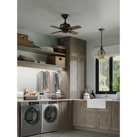 Kitchen with One Light Bell Shaped Mini Pendant With Tea Colored Shade In Forged Bronze Finish From Torino Collection over sink