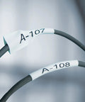 Industrial Heat Shrink Labels, Three Quarter Inch Tube With Crisp Black Lettering on wires A-107 and A-108.