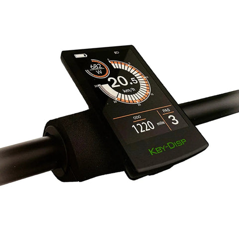 Ride-Ready Ebike LCD Display Meter KD718 Waterproof Bike Computer on handlebar showing speed and distance, black ABS housing.