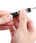 Center drill bit with 1/4-inch hex shank, 5 mm size, held by fingers for woodworking