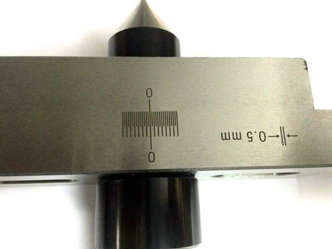 Close-up of Pro Grade 3MT Taper Turning Attachment for Offsetting Lathe Tailstock with hardened alloy steel point and engraved measurements.