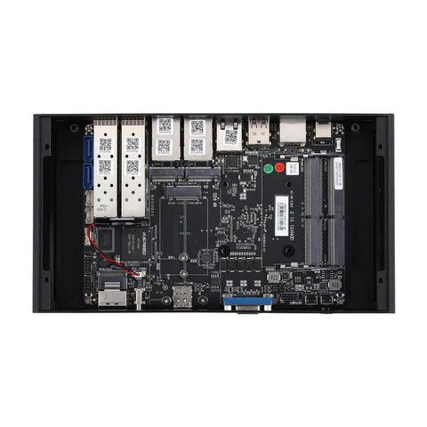 Mini Pc Tower Powered By The Atom C3958 Processor With Sixteen Gb Ram Featuring Four Ten Gigabit Sfp Plus Fiber Links Alongside Five Two Point Five Gbe Ethernet Ports In Beast Mode For Bulletproof Firewalls And Smoother Business Hubs internal motherboard view with ports and slots.
