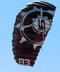B3 Light Traction 3 Meter Kite For Kiteboarding with detailed maroon fabric design in mid-flight against blue sky