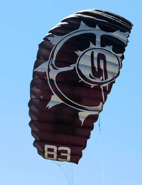 B3 Light Traction 3 Meter Kite For Kiteboarding with detailed maroon fabric design in mid-flight against blue sky