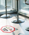 Stop That Tugger Now With These Heavy Duty Red Anti Slip Floor Decals Featuring Tough Round Vinyl Stickers For Warehouses And Factories To Boost Safety And Guide Forklifts Perfectly On Any Surface, octagonal red floor decal with 'Tugger Stop' text