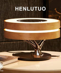 Maple Log Table Lamp With 10W Wireless Charging Two 5W Bluetooth Speakers Bass LED Light on a table