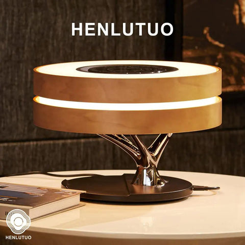Maple Log Table Lamp With 10W Wireless Charging Two 5W Bluetooth Speakers Bass LED Light on a table