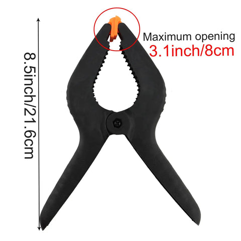 Six Pack 9 Inch Hefty Spring Clamps Made From Tough Nylon With Cushioned Jaw Tips Engineered For Knockout Grip Efficiency And Quick Swaps On Woodworking Or Photo Studio Crafting Sessions. 8.5 inch clamp with 3.1 inch max opening.