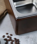 Premium Wooden Espresso Tamper Holder With Slick Drip Catch Tray And Knock Box showing wood finish and stainless steel details.