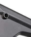 Close-up of gray fixed stock for rifle-length extension tubes without A2 spacer, focusing on the sloped cheek weld and rubber butt pad.