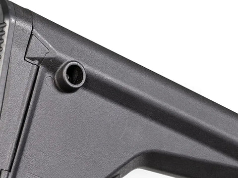 Close-up of gray fixed stock for rifle-length extension tubes without A2 spacer, focusing on the sloped cheek weld and rubber butt pad.
