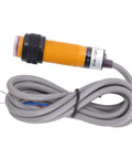 Close-up of Through Beam Photoelectric Switch Kit With Five Pairs PNP Normally Open Sensor, gray wiring, and yellow casing