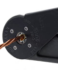 Close-up of Four Way Crimp Tool With Spring Loaded Plungers, Fingertip Adjustment For Two Connector Sizes crimping a wire