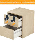 Adjustable Drawer Front Installation Clamps Kit With Rock Solid Bow Construction Dead Simple No Sweat Quick Fit Cabinet Hardware Jig C Clamps For Woodworking Easy Mounting Tool Two Black Pieces on a drawer front.