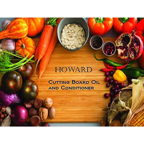 Heavy-Duty Go-To Butcher Block Conditioner And Cutting Board Oil, 12 Oz, surrounded by colorful vegetables on a wooden board.