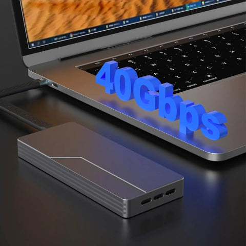 Built Tough 40Gbps M.2 NVMe SSD Enclosure With Sleek Aluminum Build And Internal Turbo Cooling Fan connected to a laptop.