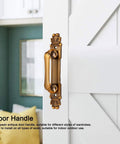 European Style Antique Metal Door Handle Set Of Two For Drawer Cupboard Wardrobe installed on white wooden door