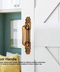 Two Pack Zinc Alloy Door Pull Handles In European Antique Style on a white barn door, shown in an indoor room.