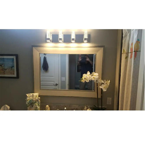 Bathroom with LED Vanity Lighting Fixture for Bathroom with Champagne Bubble Crystal Shades in Chrome Finish Dope Modern 4 Light Bar Vanity Light for Bright Fresh Bath above mirror.