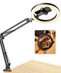Ultra Flexible Overhead Ring Light With Desk Mount And Hands Free Phone Holder 10 Inch Selfie Light On A Stand Tripod For iPhone Perfect For Video Recording Zoom Calls Livestreams TikTok And YouTube, showing arm mount on desk.