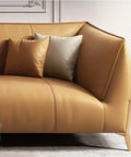 Heavy Duty Metal Sofa Legs To Level Up Your Living Space Rock Solid Couch Support For Tables And Beds Including Screws, showcasing a modern tan curved sofa with pillows.
