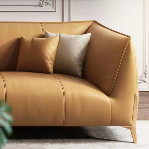 Heavy Duty Metal Sofa Legs To Level Up Your Living Space Rock Solid Couch Support For Tables And Beds Including Screws, showcasing a modern tan curved sofa with pillows.