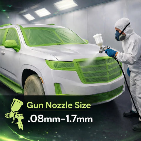 Automotive spray painting: white SUV masked with green tape in a paint booth; worker in PPE using a spray gun.