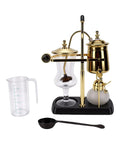 Artisan Manual Siphon Coffee Maker Featuring Sturdy Heatproof Glass Carafe with measuring cup and spoon on counter.