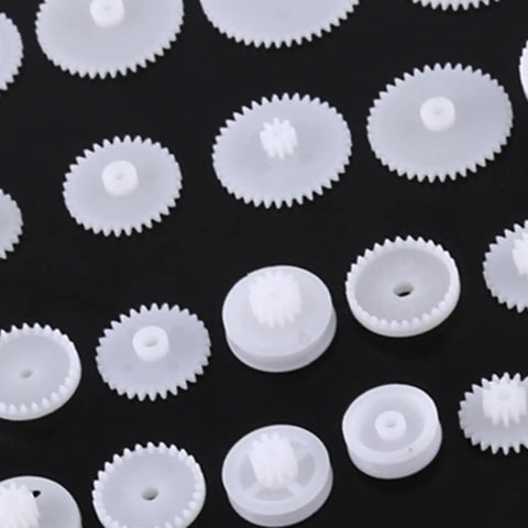 Plastic Gears Kit For DIY Animatronics And Robotics Projects, Double Gear Motor Set With 64 Parts on black background