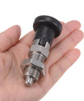 Real Deal Drop Dead Durable Stainless Steel Push Fit Ball Nose Spring Plunger M16 X 1.5 Thread 8 Millimeter Pin in hand.