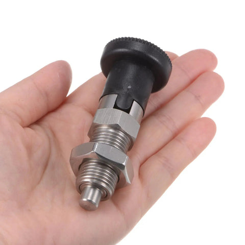 Real Deal Drop Dead Durable Stainless Steel Push Fit Ball Nose Spring Plunger M16 X 1.5 Thread 8 Millimeter Pin in hand.