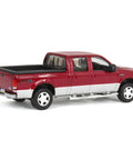 Ford F 250 Super Duty Crew Cab Diecast Pickup Truck Red And Silver One Sixty Fourth Scale Model With Dope Metal Chassis And Real Rubber Tires Collectible Display Piece viewed from rear side angle